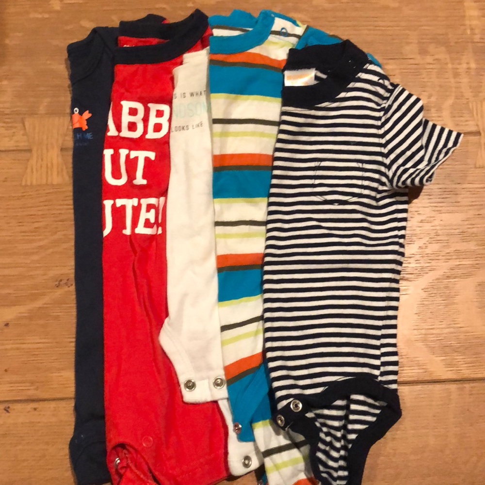 Bundle of five newborn onesies